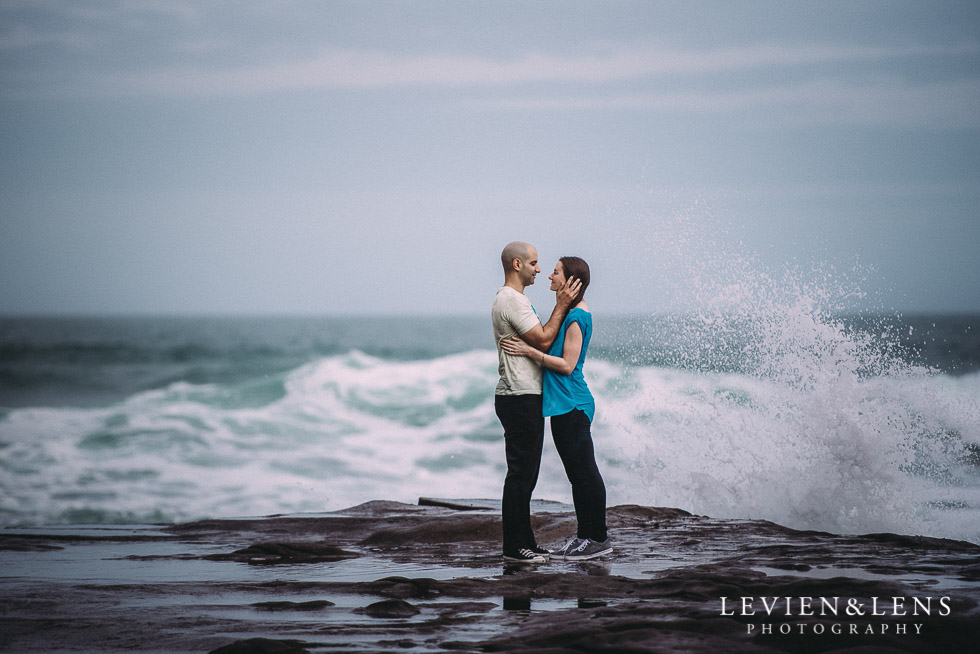 waves and rocks - Muriwai Beach couples-engagement photo shoot {Auckland wedding photographer}