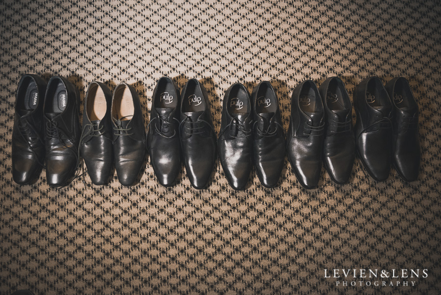 groom getting ready shoes - Langham Hotel Wedding {Auckland-NZ weddings photographers}