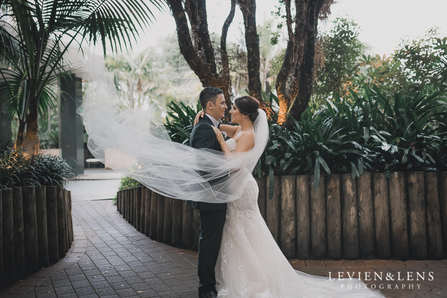 flying veil - bride and groom intimate session outside - Langham Hotel Wedding {Auckland-NZ wedding photographer}