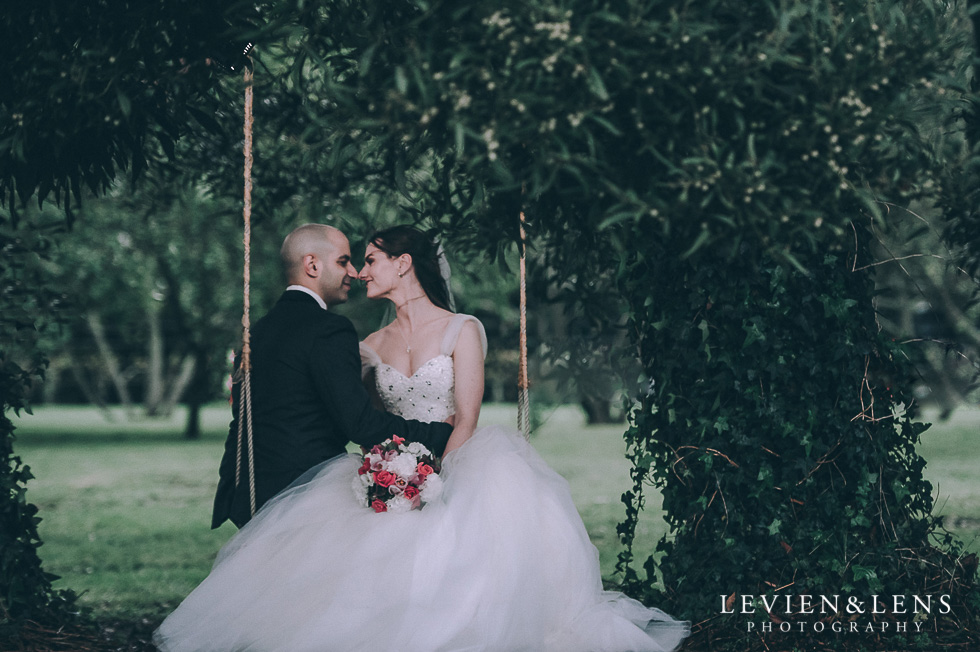 bride and groom on swing - Markovina Vineyard Estate - Kumeu {Auckland wedding photographer}