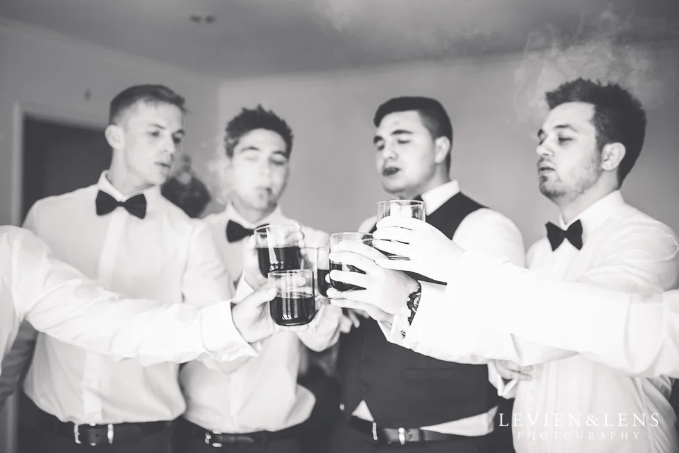 groom with groomsmen - New Zealand wedding photographer
