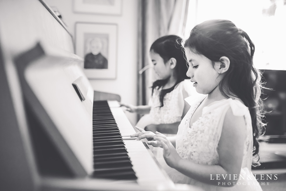 flower girls at piano - getting ready {Hamilton NZ wedding photographer}