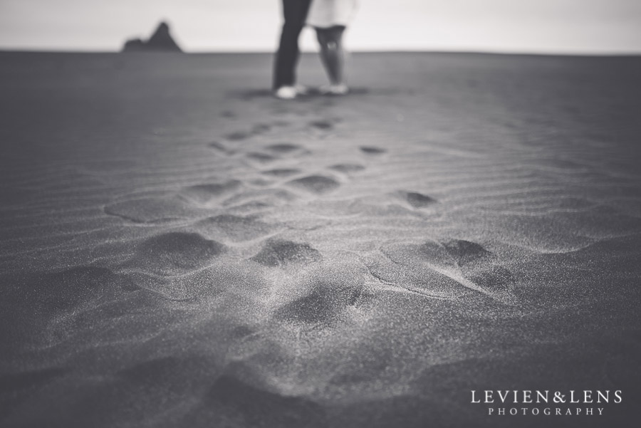 couple on sand - Karekare Beach post-wedding | elopement photo shoot {Auckland NZ couples-weddings photographer}