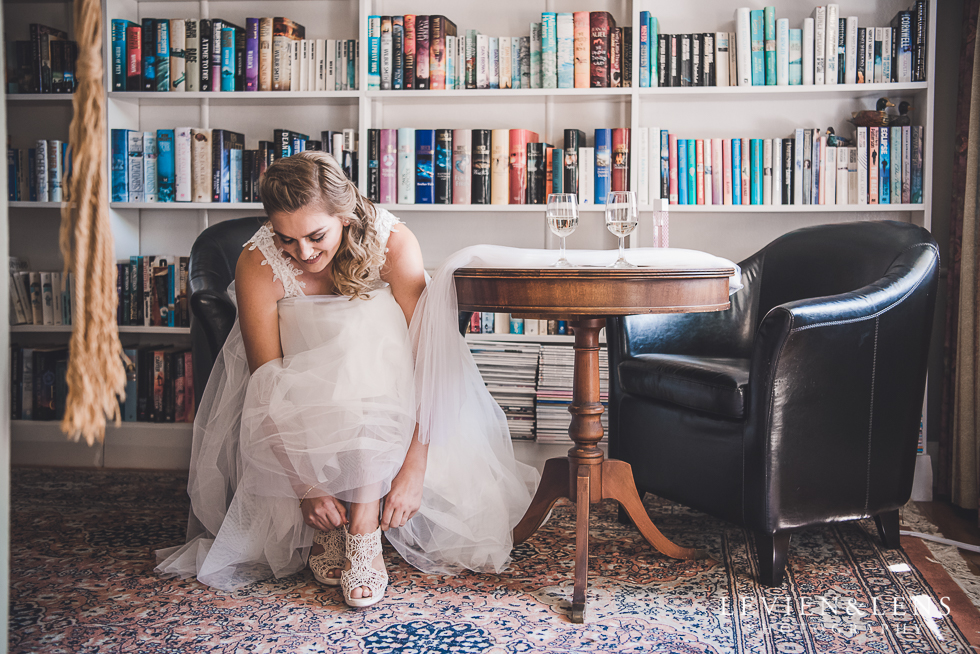 bride getting ready in library