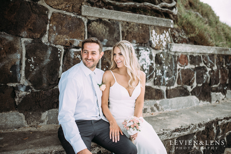 bride and groom sitting down