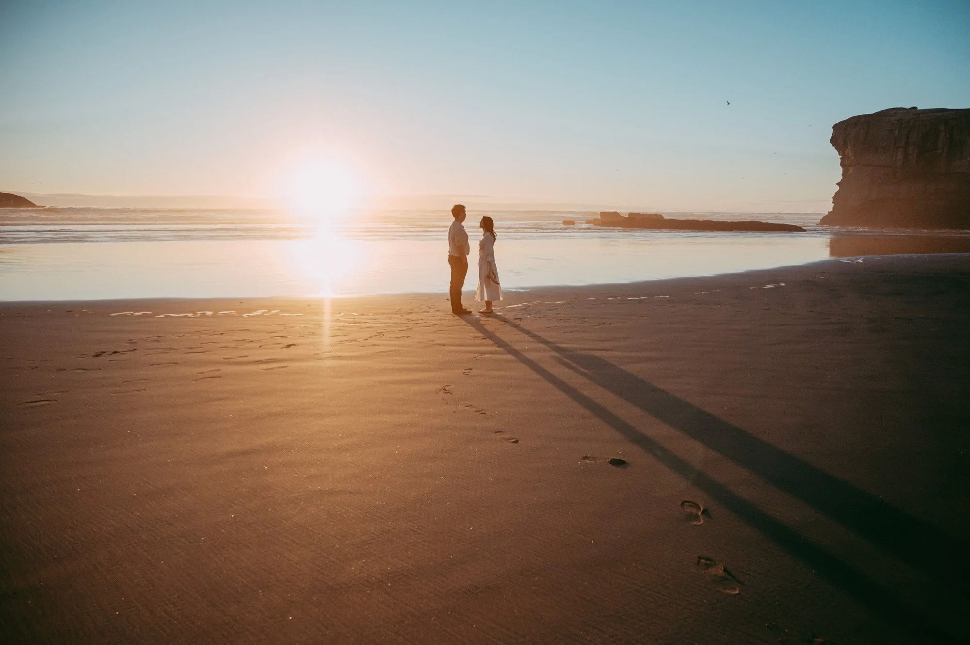 Sunset engagement session - Muriwai forest and beach (Pre-wedding photographers Auckland)
