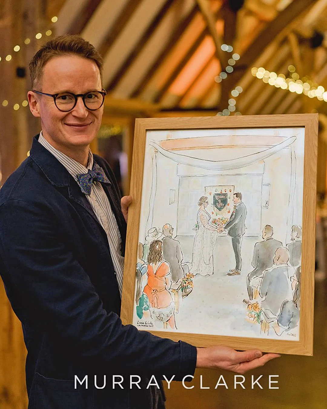 A live wedding ceremony illustration I completed in Chichester for Luke &amp; Lizzie back in November 2025. Such a great day and these photos capture the 'reveal' moment when I presented the couple with their completed ceremony painting just before t