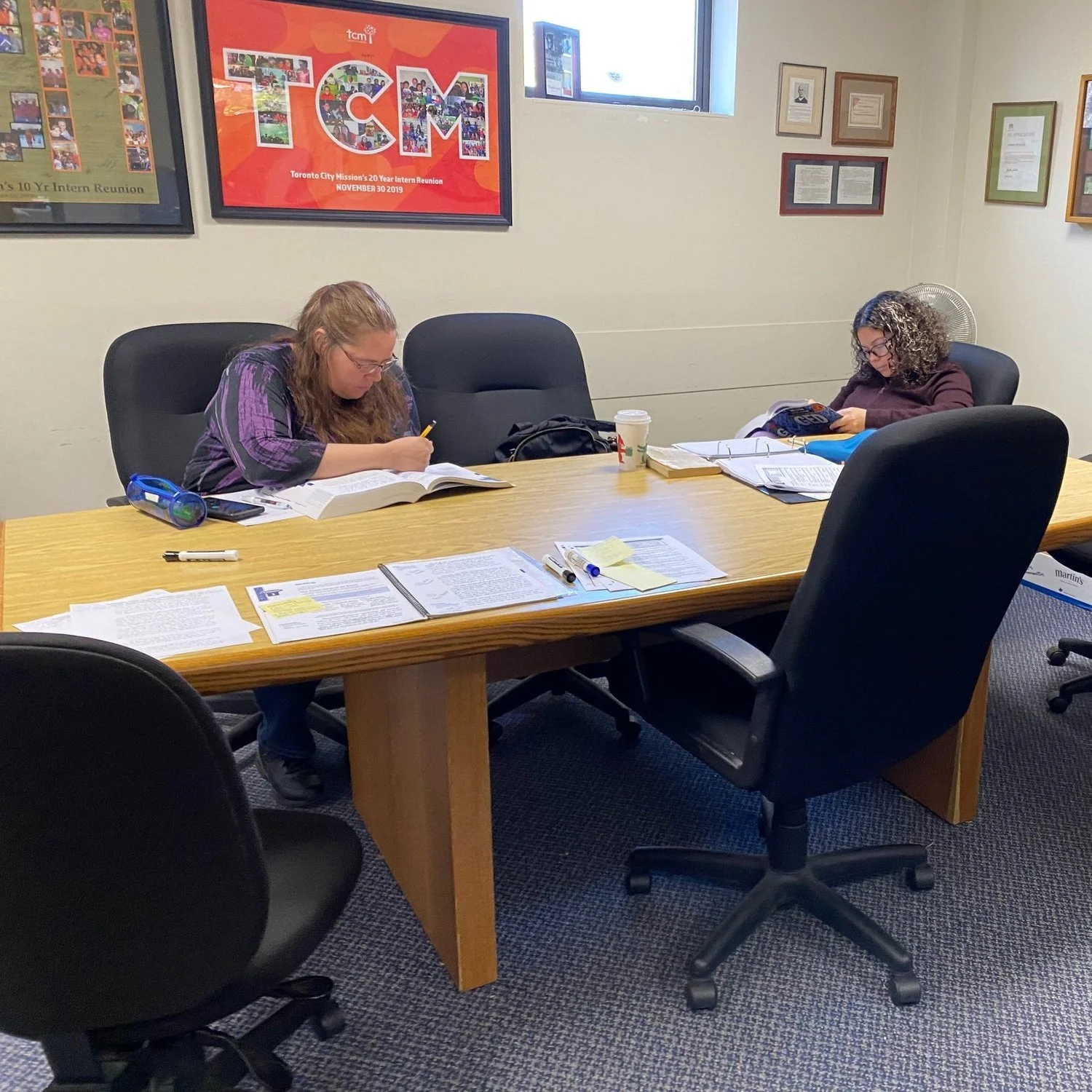 tcm-outreach-role-model-moms-studying.jpg