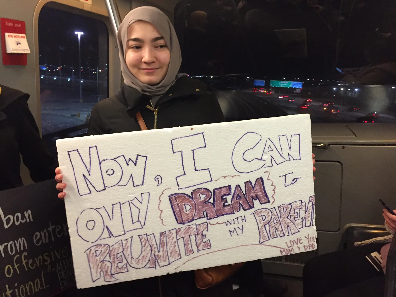 A young Syrian woman protests Trump's Muslim ban at O'Hare International Airport on January 29. Photo: Angela Campion