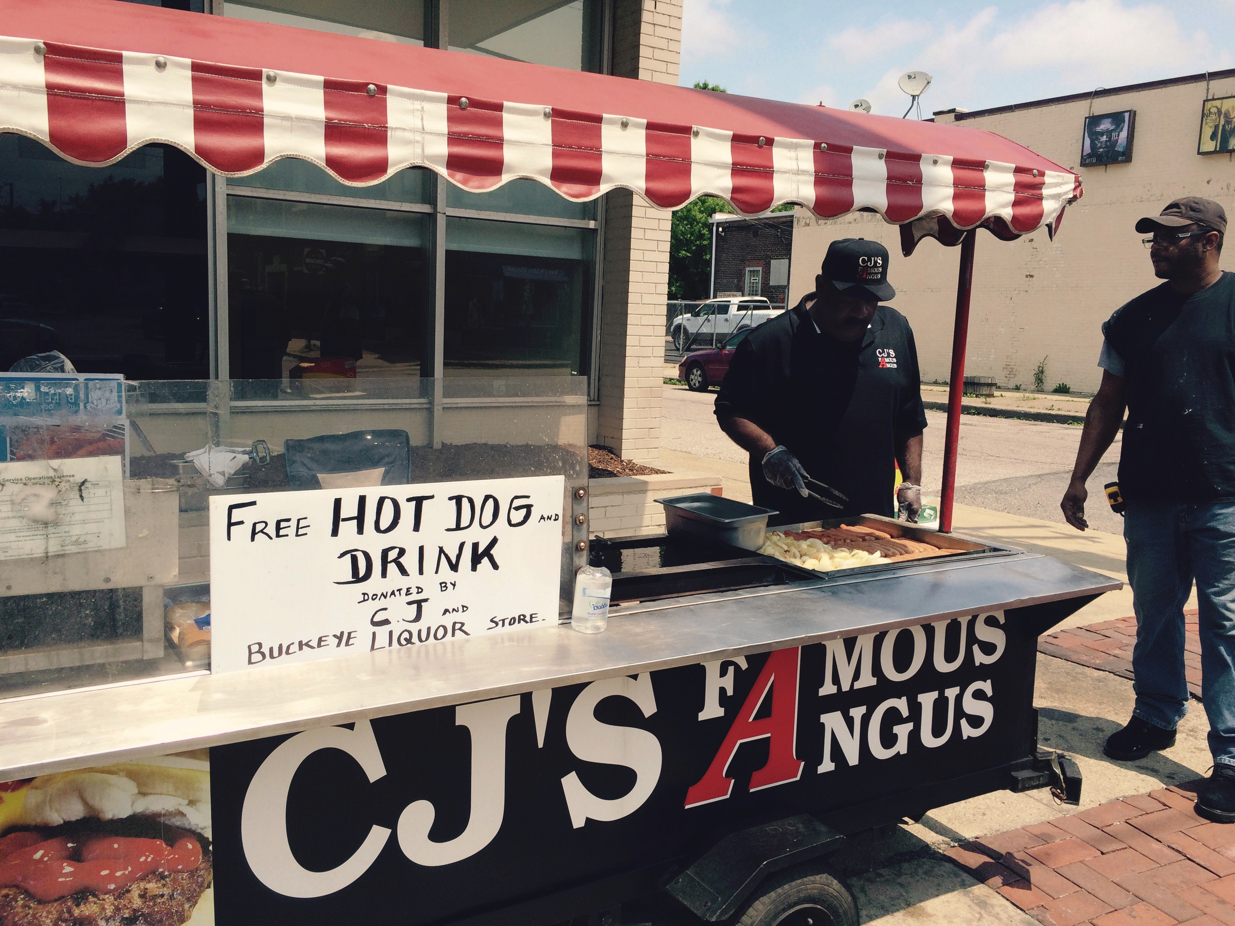 CJ flips free hot dogs.