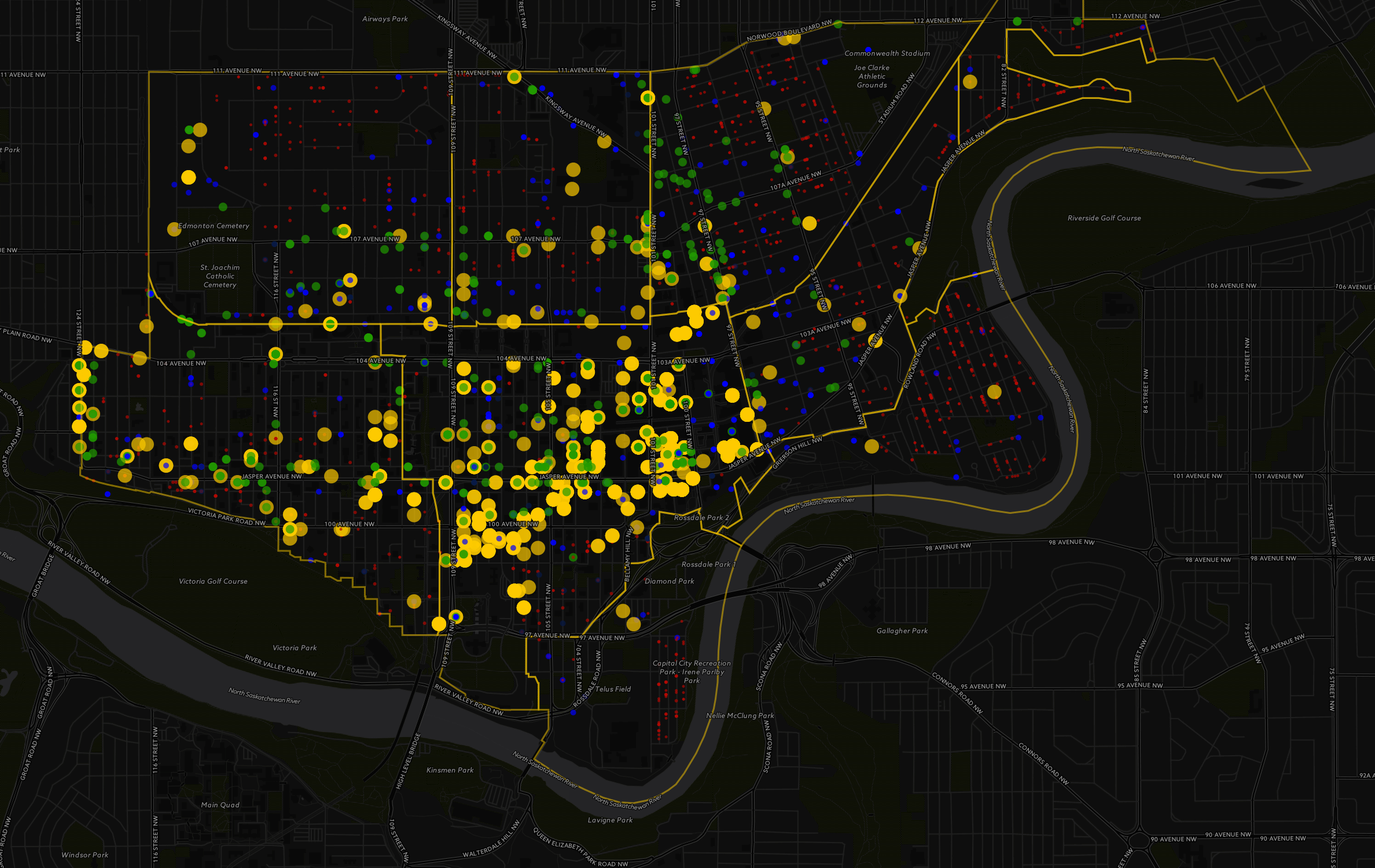 Figure 4: Permits by Building Classification. Small red dots are residences (apartments, condos, houses) and associated structures (detached garages, sheds, etc). Blue are engineering (infrastructure maintenance, utilities, hoarding, etc). Green are various retail, restaurants and bars. Yellow are offices. Rings, for instance a green dot ringed by yellow, indicates that a location has permits for both, as an example, retail and office.