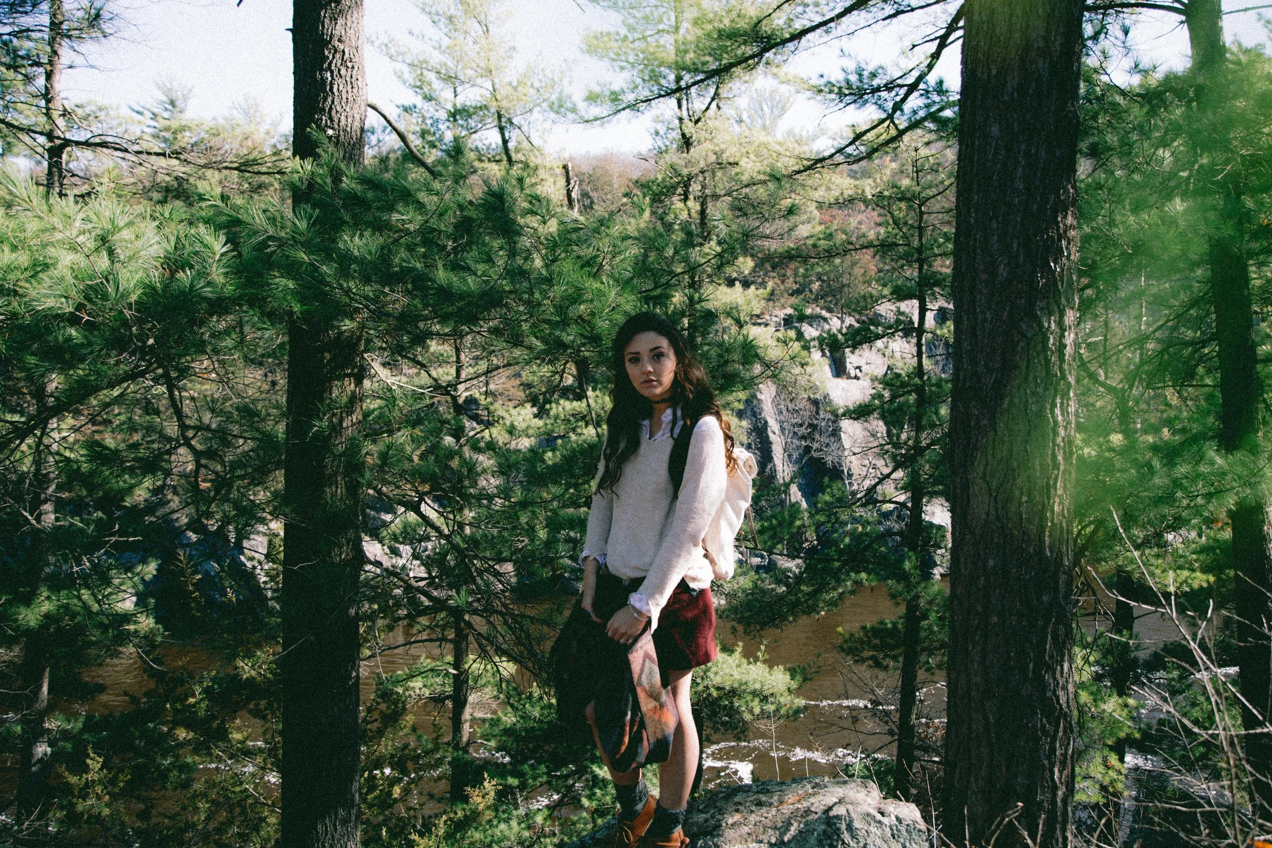 Brandy Melville Sweater (similar) | J.Crew Flannel (similar) | Brandy Melville Bruce Skirt | Chambers Low Sneakers by Frye | SmartWool Socks | Duluth Pack Roll Top Scout in Natural | Forever21 Blanket Scarf (similar)