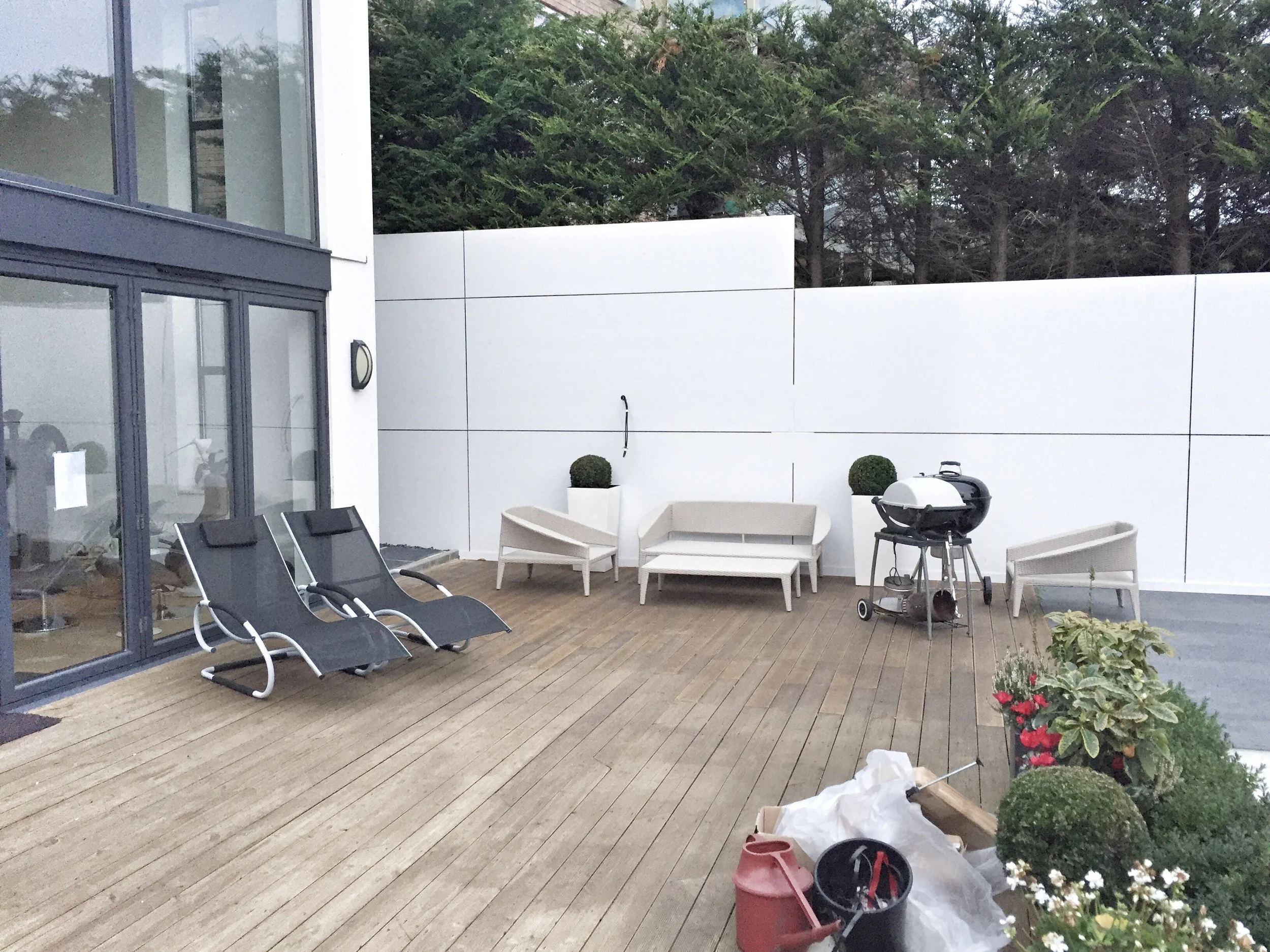 The customer has oiled the decking to attain a darker colour. 