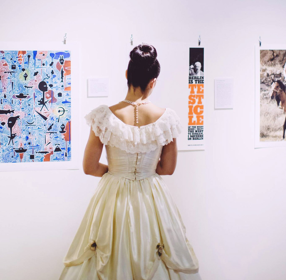 Russian dancer taking time to view the contemporary Dialogues posters. Photo : Edward Honaker