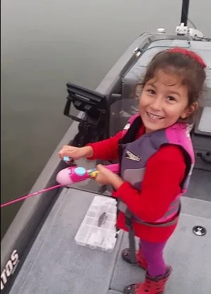 Young Girl Catches Big Bass on Barbie Pole
