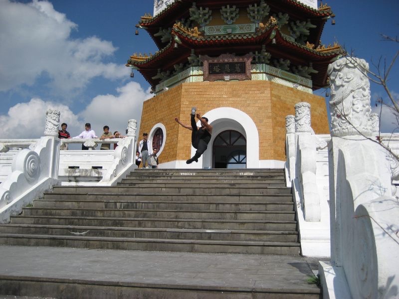 In action in front of a pagoda - Sun Moon Lake, Taiwan 2006.