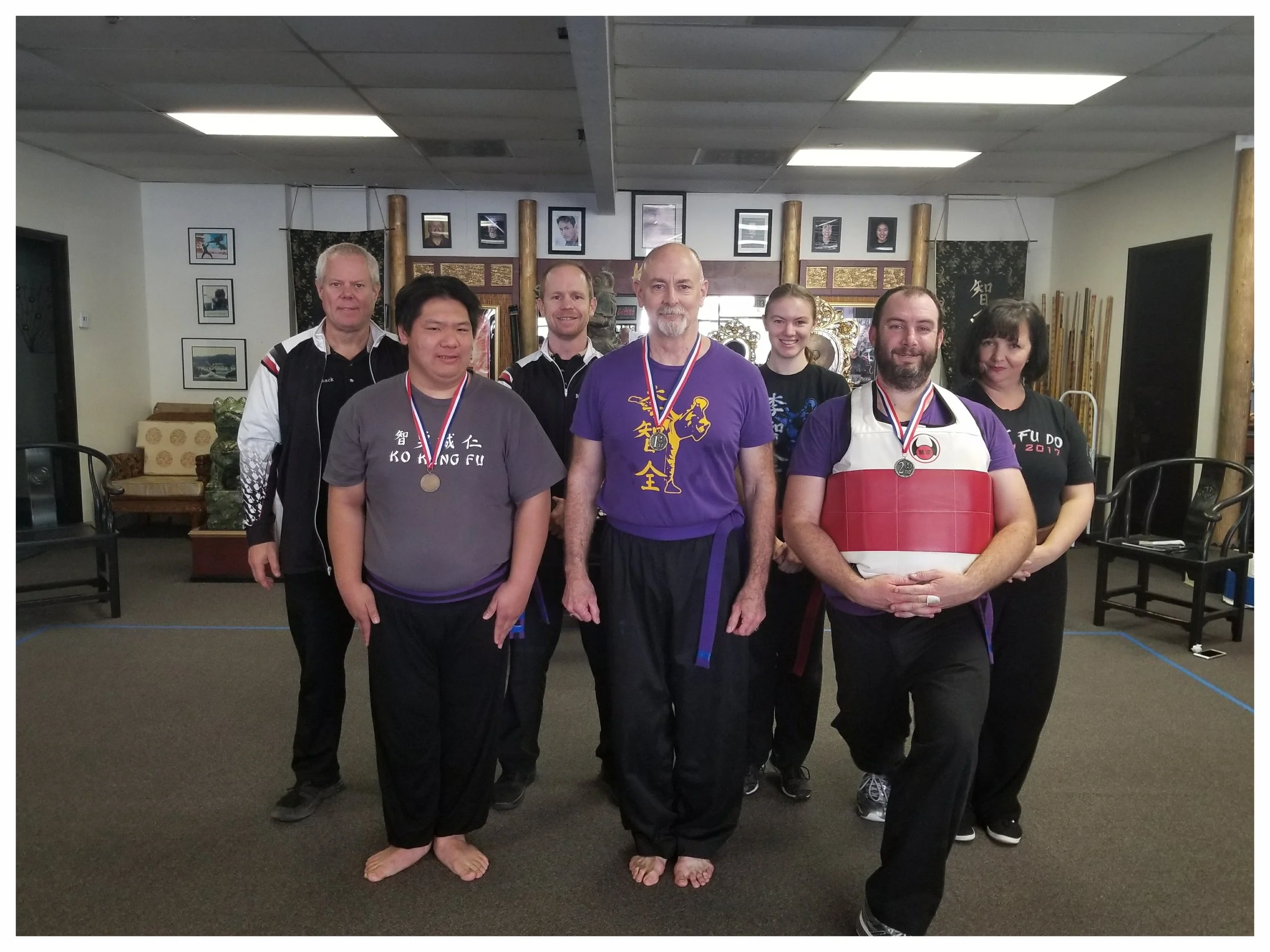 Arik Broman and fellow competitors receive their medals for the Kenpo Weapons division at the West Coast Regional Winter Kuo Shu Championship Tournament, 2018