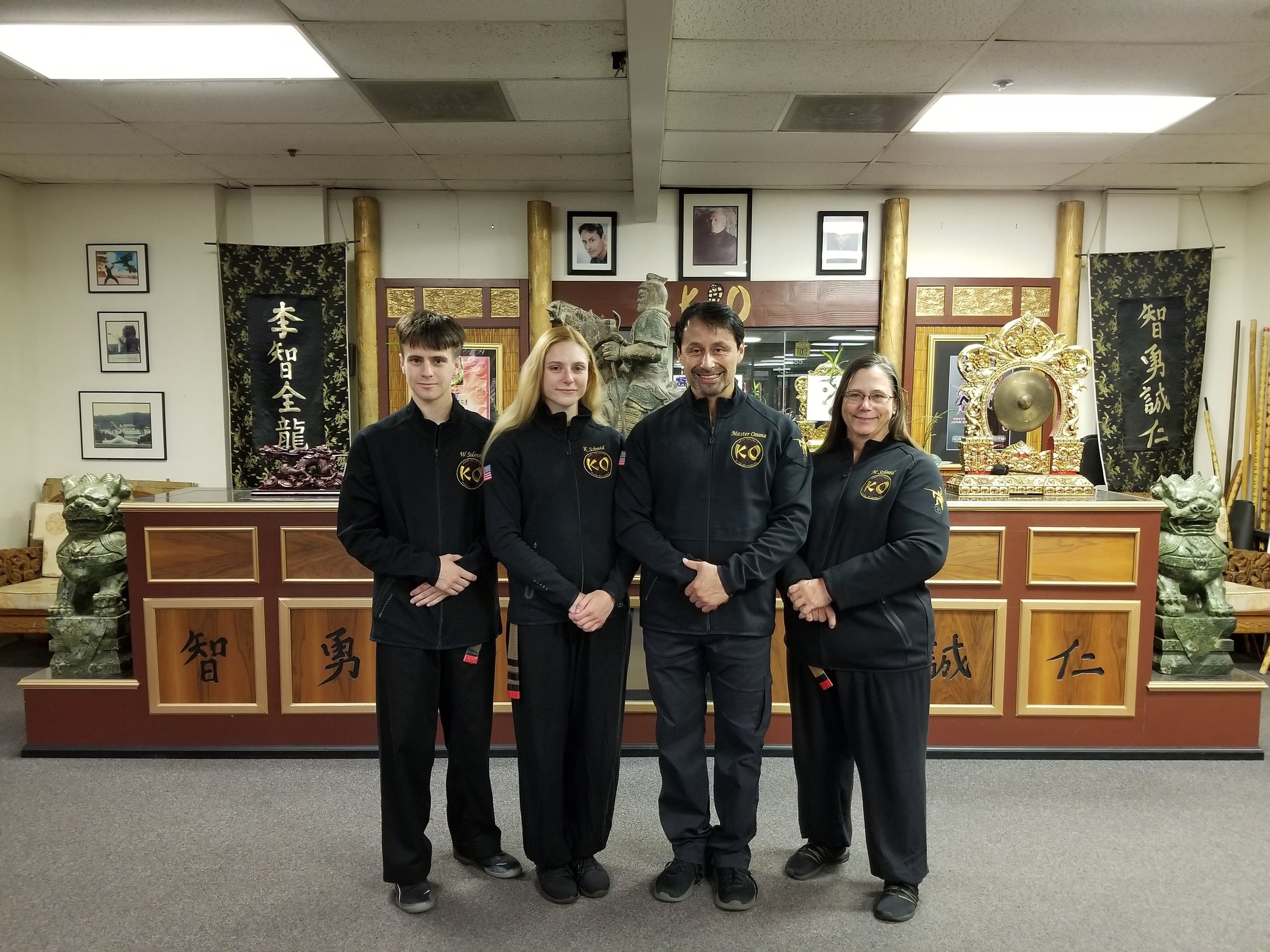 Master John Ozuna with William Solovei, Katie Schmid and Mary Schmid