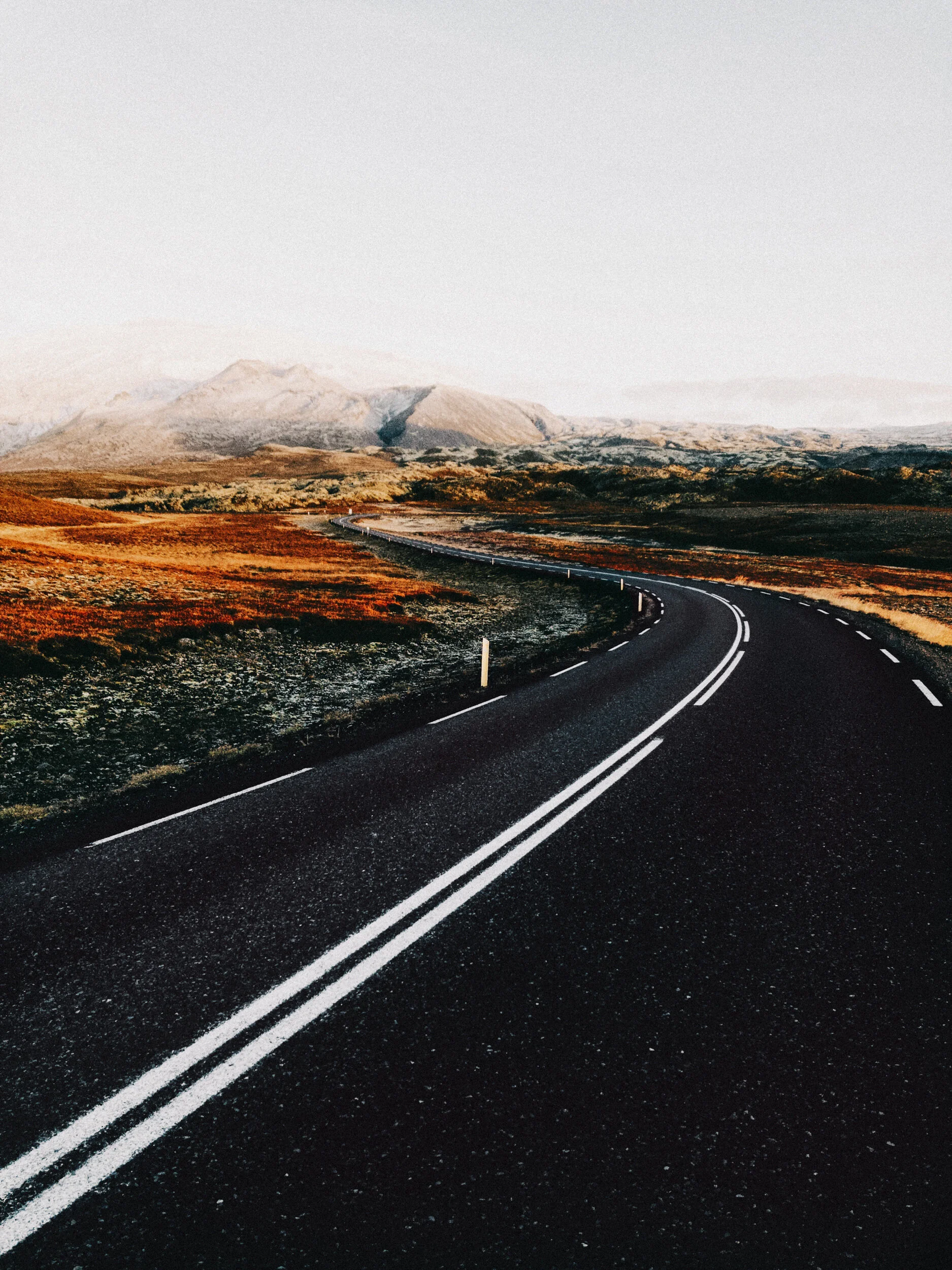 Early morning sun hitting a beautiful stretch of road near Hellnar in Iceland’s western region.