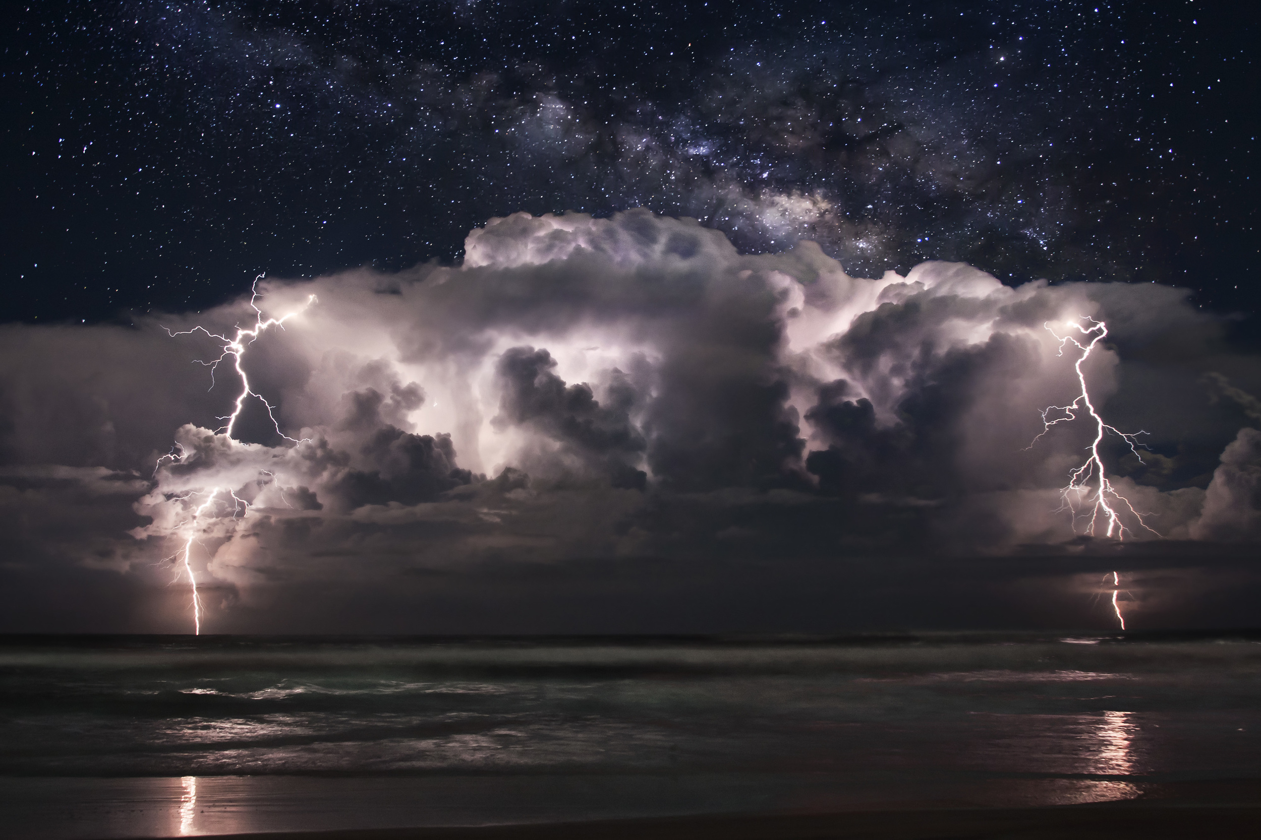  Thunderhead off the coast of Ormond Beach, Florida. Milky Way composite behind on October 12, 2011. 3 Image stack for lightning and stars.&nbsp; 