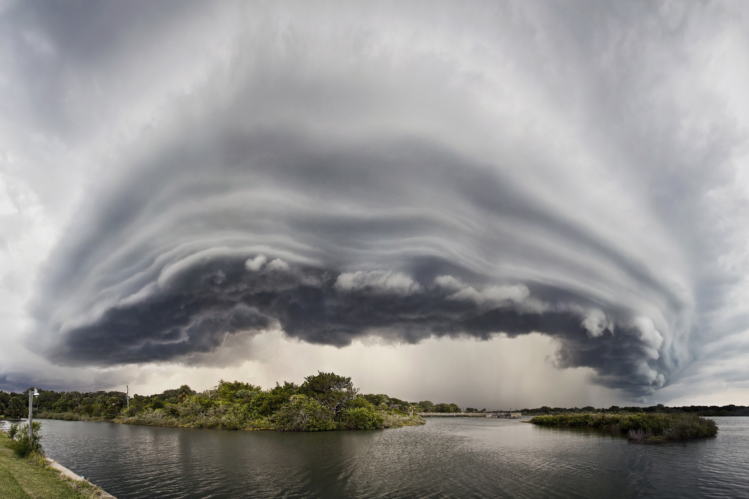  Shelf cloud over the intercoastal waters of Oak Hill, Florida Panorama. 