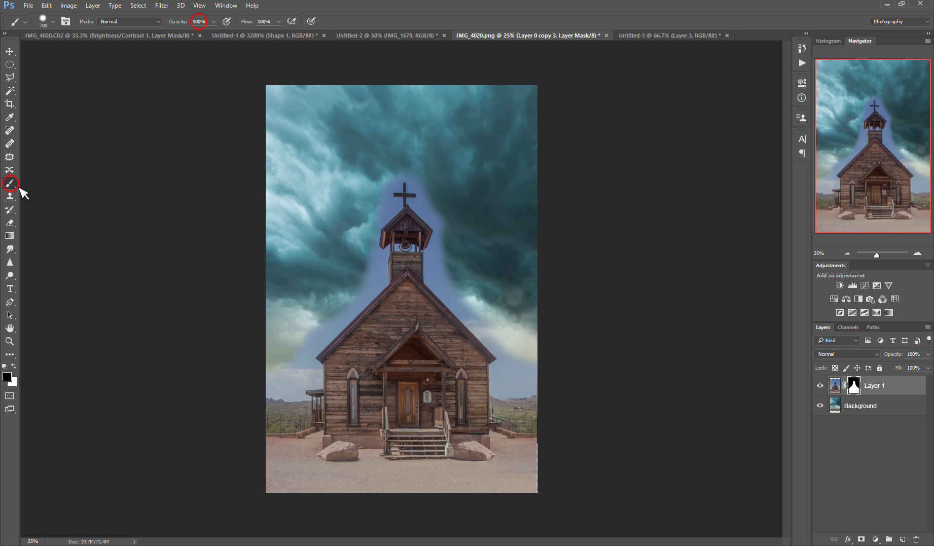 Select the brush tool at 100% Opacity and use it to roughly mask out the blue sky around the church. 