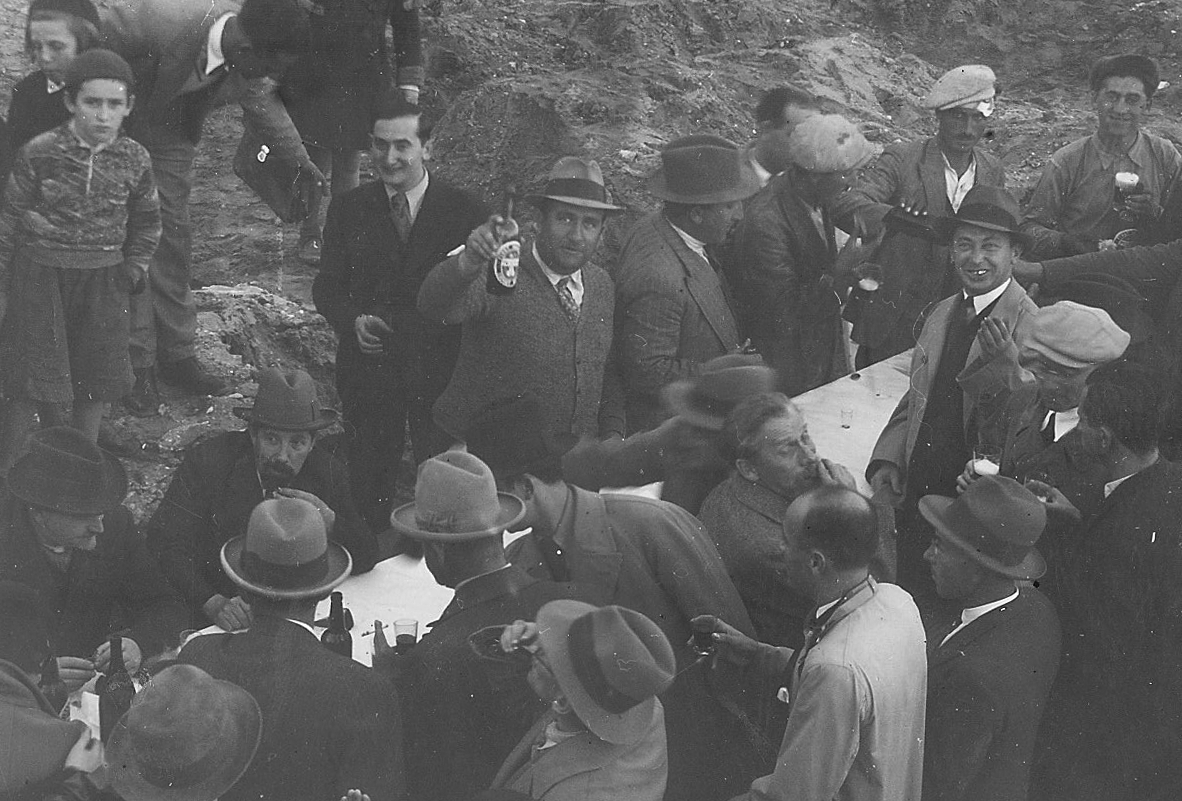 doron’s grandfather , jacob dreksler, a building contractor. here on a project kick off with is his construction team in tel aviv israel 1934. (he is holding the wine bottle, looking at the camera, with the fedora type hat)