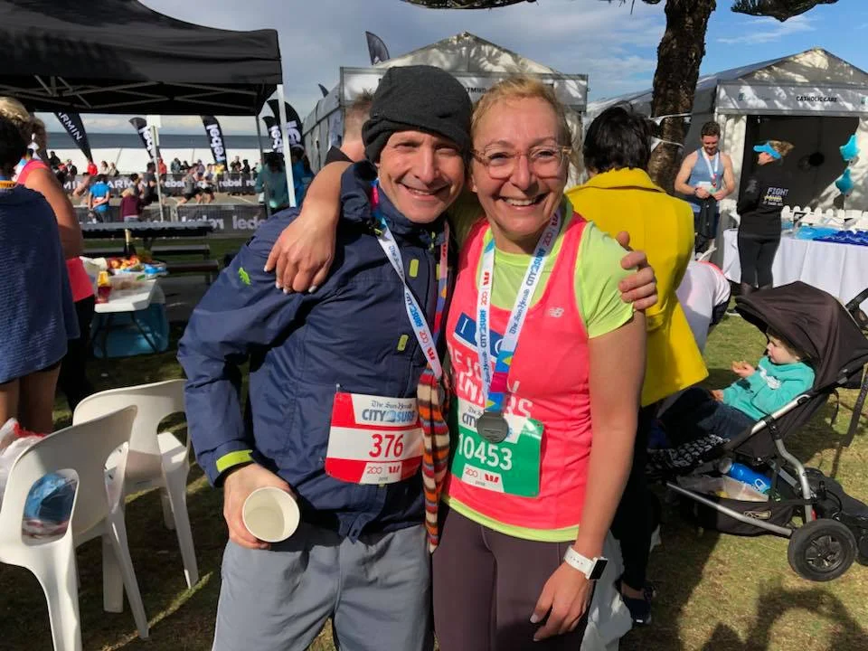 Ben Feld 52mins and his sister lisa studencki after the city to surf 2018. both very happy.