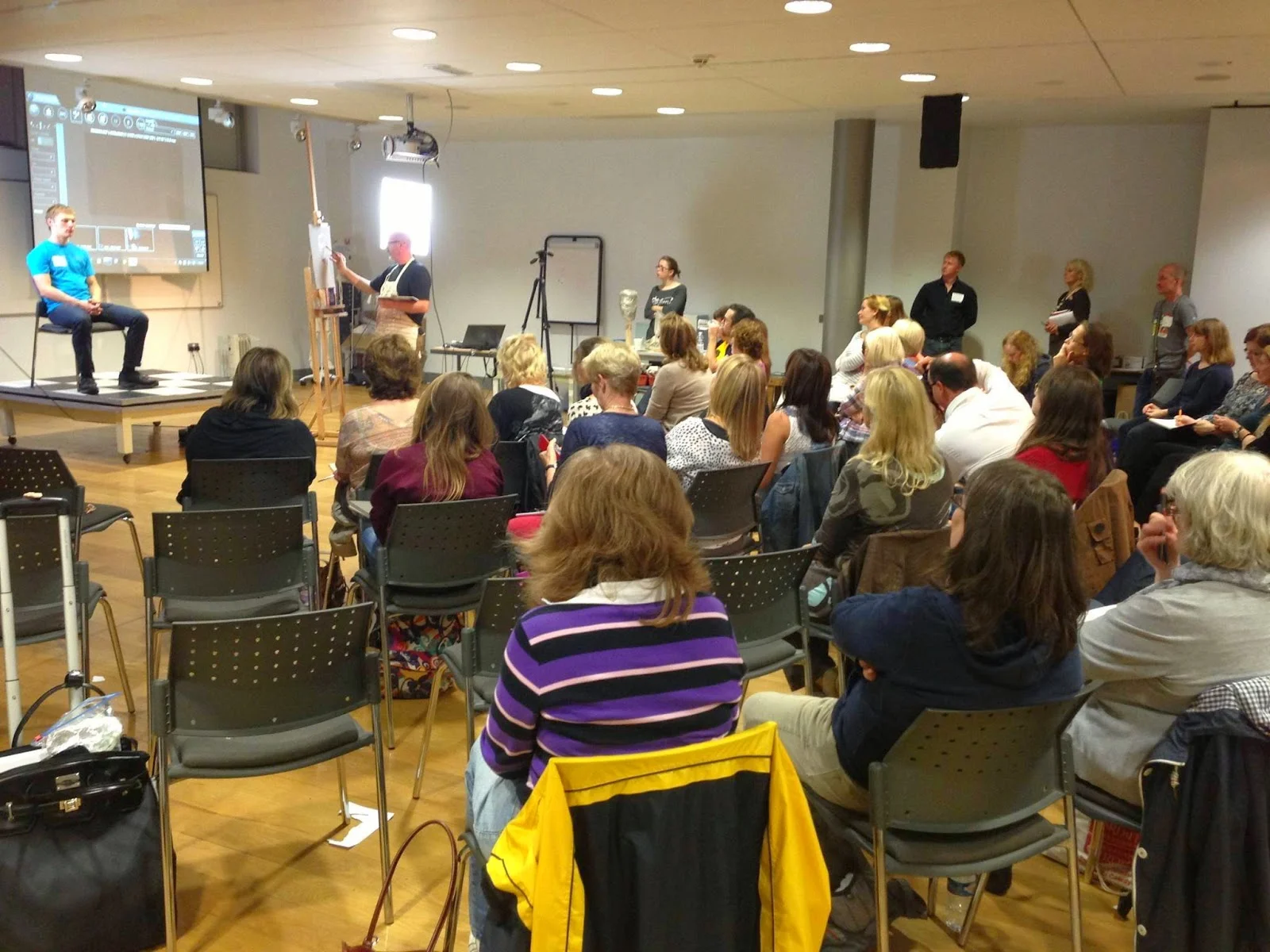 PJ Lynch giving his portrait demonstration. 