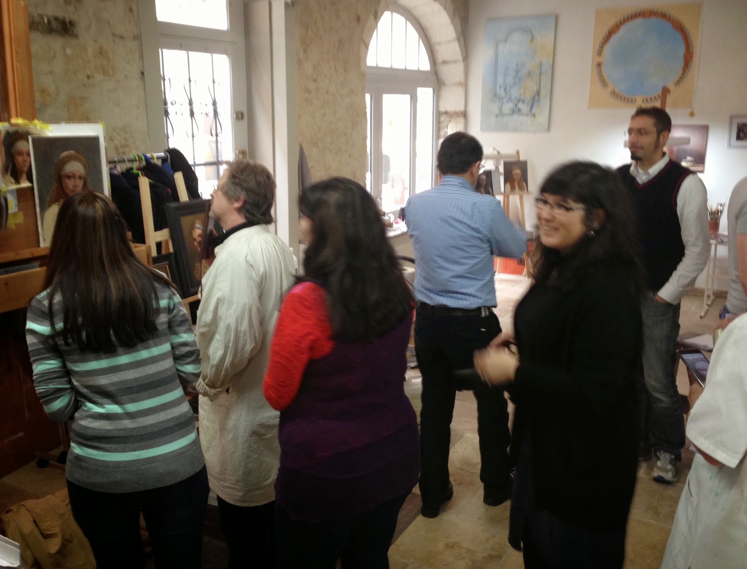 Peering at David's demo. On the right is the lovely Kyoko, who managed the studio and kept us in order...