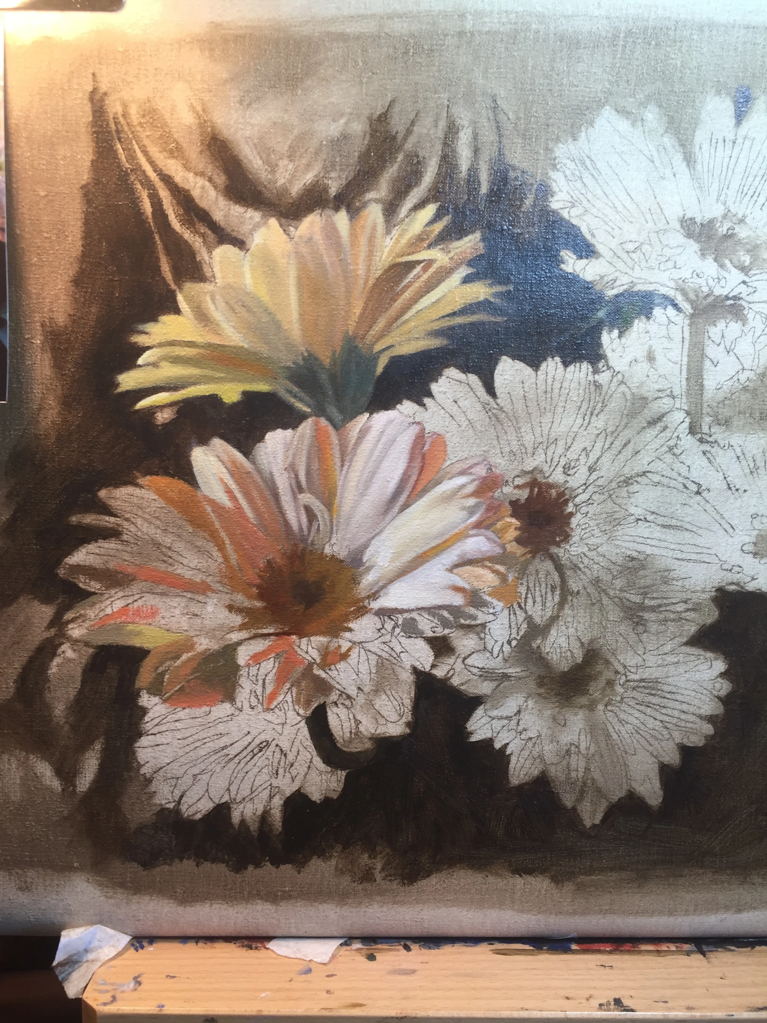 Putting in the first layer of colour, one flower at a time