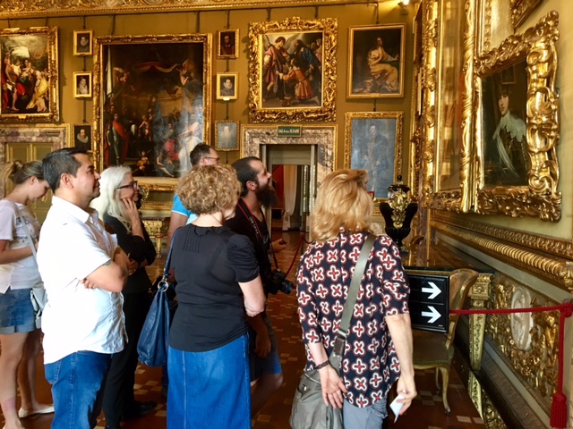 Cesar guiding us through the Pitti Palce examining old master paintings. 