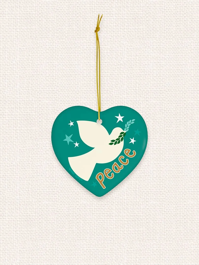 dove peace stars image on turquoise colored background holiday christmas winter ornament 3 inch heart shaped porcelain ceramic