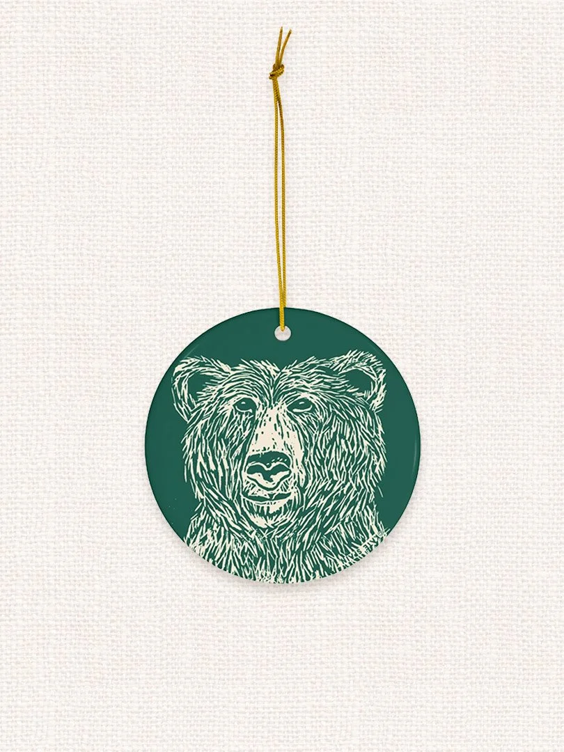 bear image on pine green background decorative holiday christmas winter ornament 3 inch round porcelain ceramic