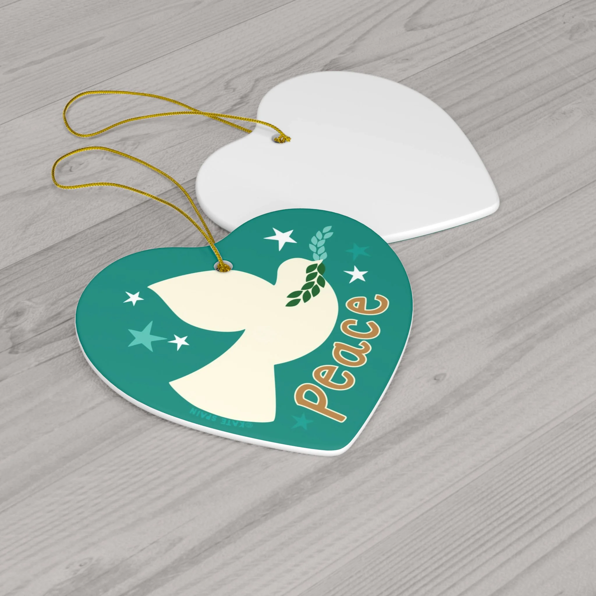 dove peace stars image on turquoise colored background holiday christmas winter ornament 3 inch heart shaped porcelain ceramic front and back