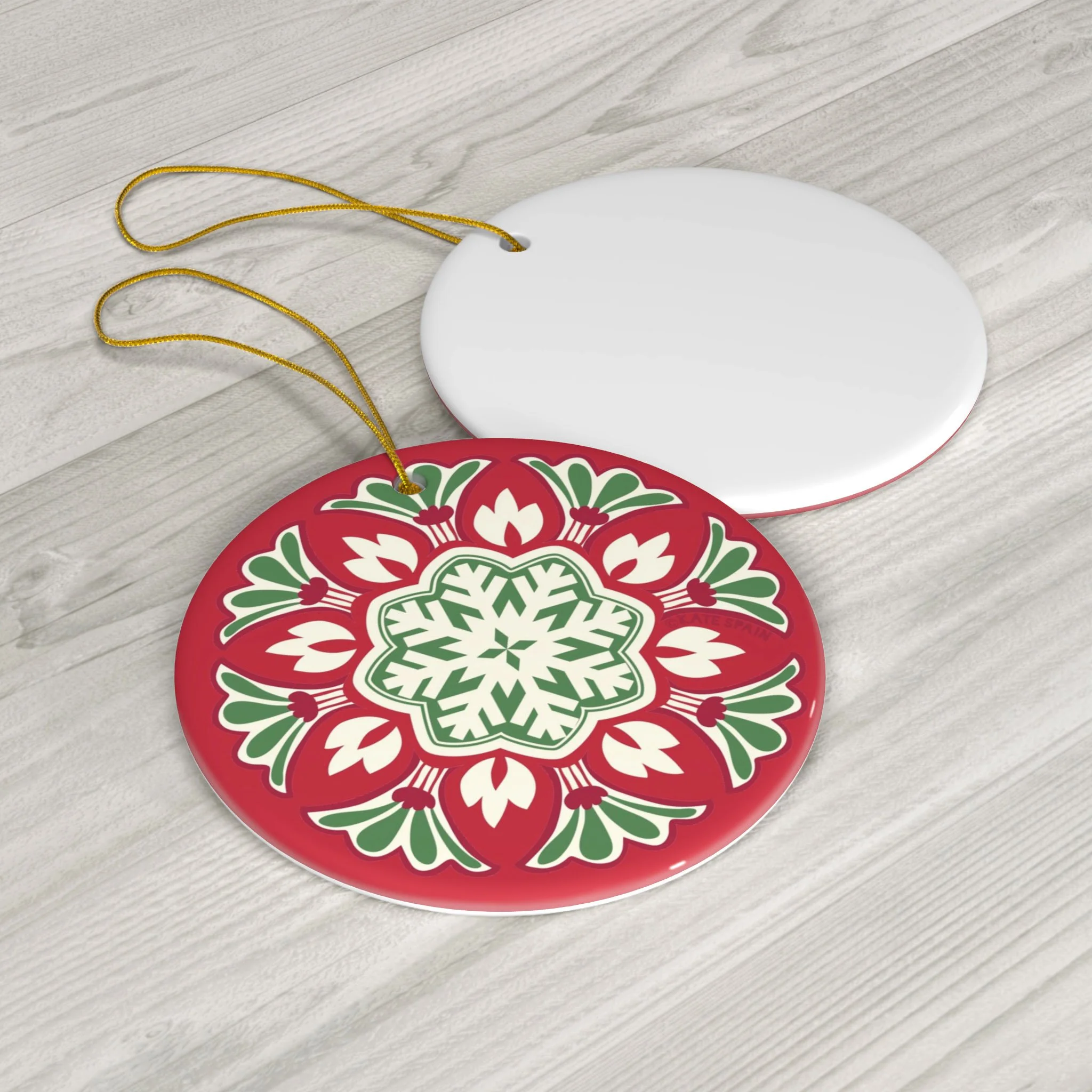 decorative red and green snowflake on red background holiday christmas winter ornament 3 inch round porcelain ceramic front and back