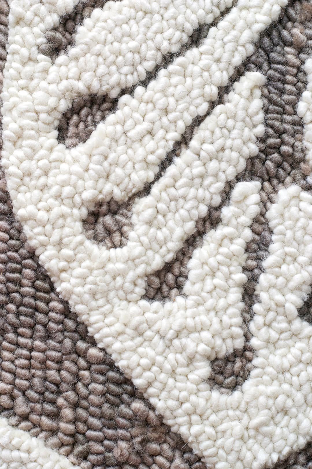 taupe_leaf_rug_detail-eye-heart-hand.jpg