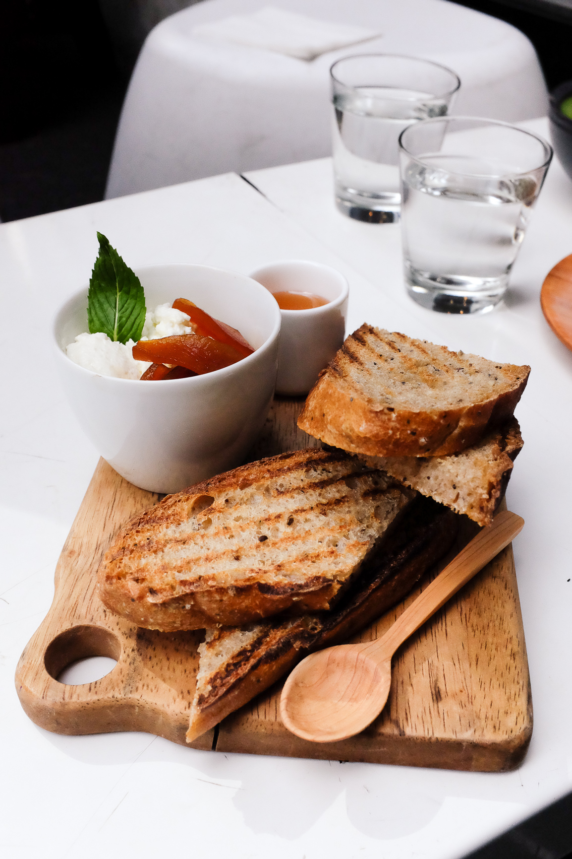 Sourdough with caramelised fuji apple, ricotta cheese and organic wild honey ($9.00)