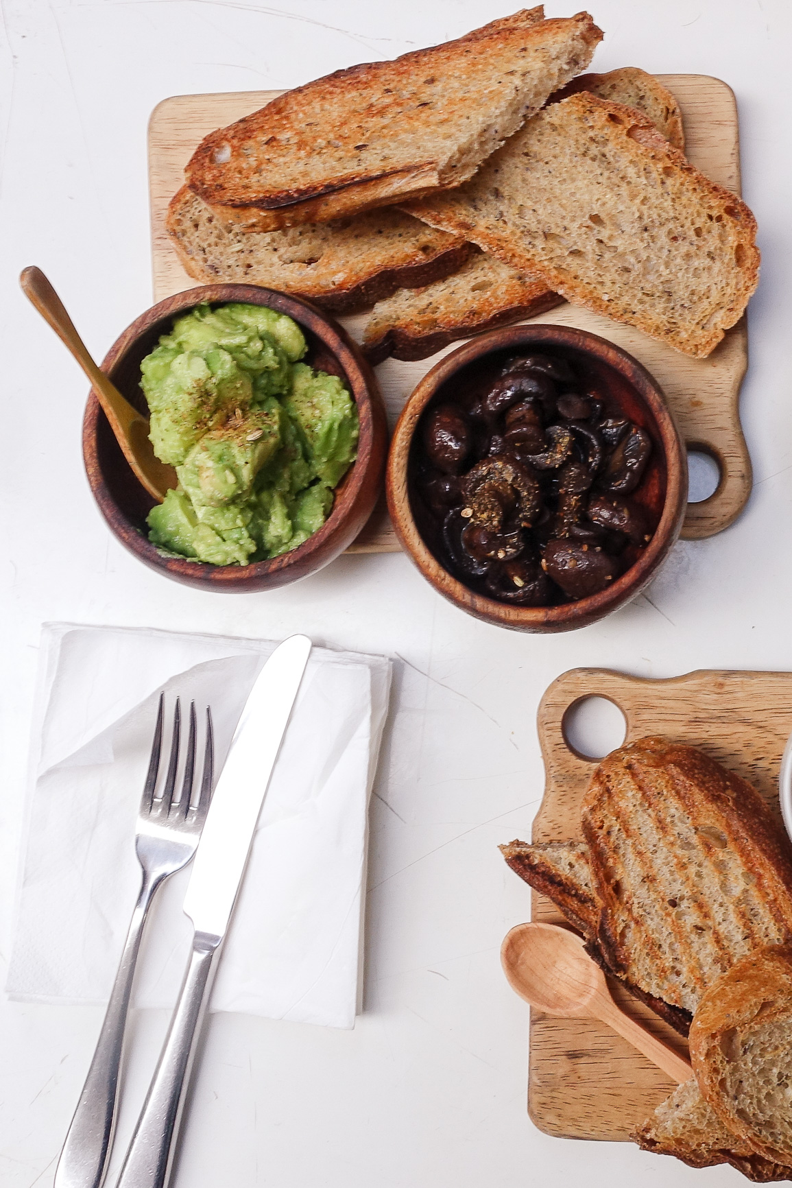 House made whole grain sourdough toast with avocado and swiss brown mushrooms ($10.00, $3.00 for add on of mushroom)