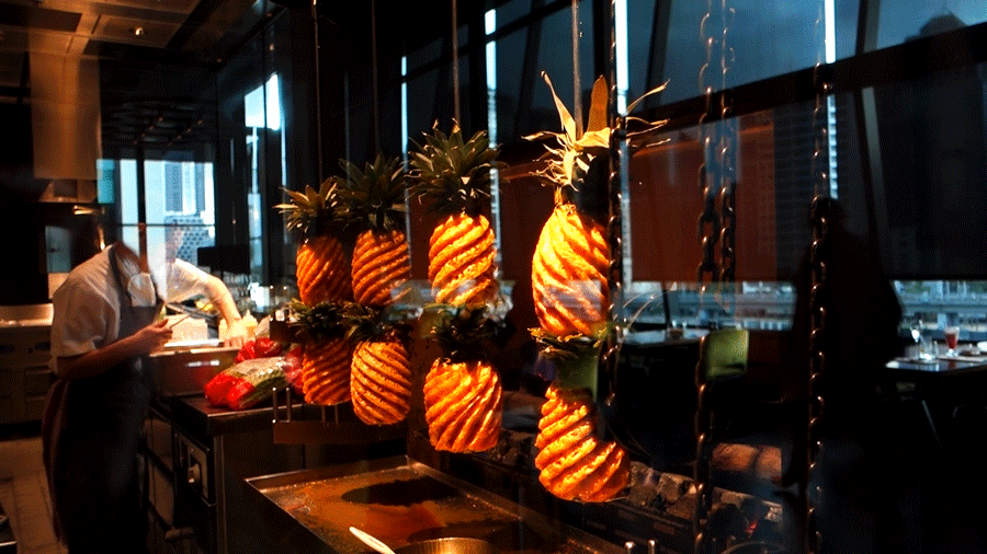 Almost mesmerising pineapple spit roast