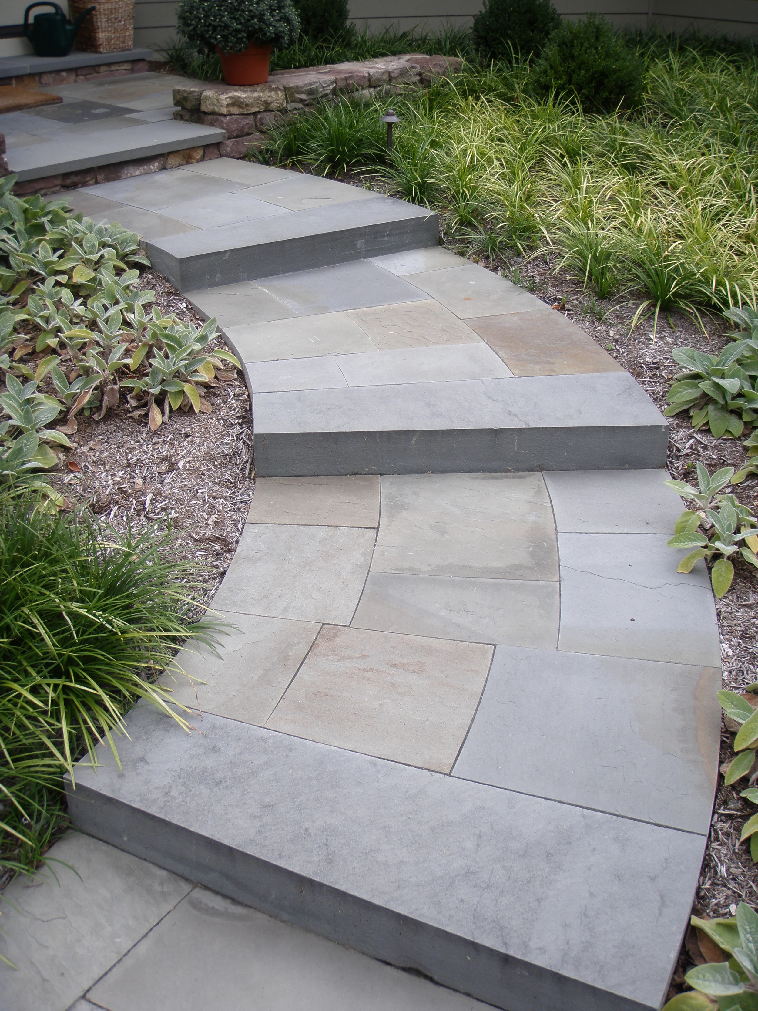curved bluestone steps garden design