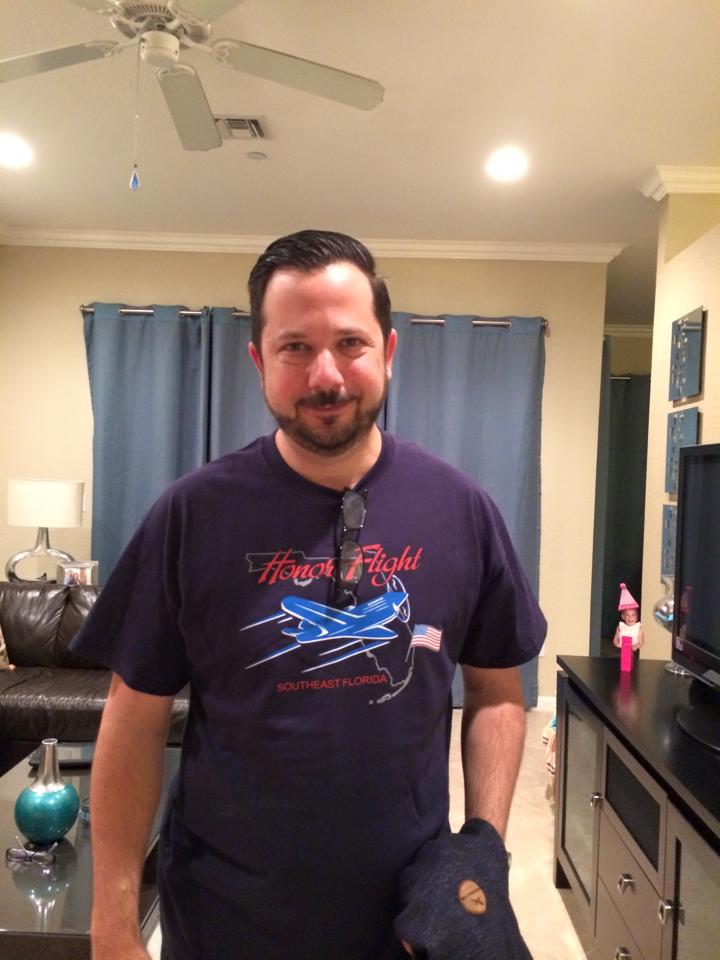 Suzi Galdys takes a quick send-off photo of her husband Phil Galdys before he leaves for the West Palm Beach airport.