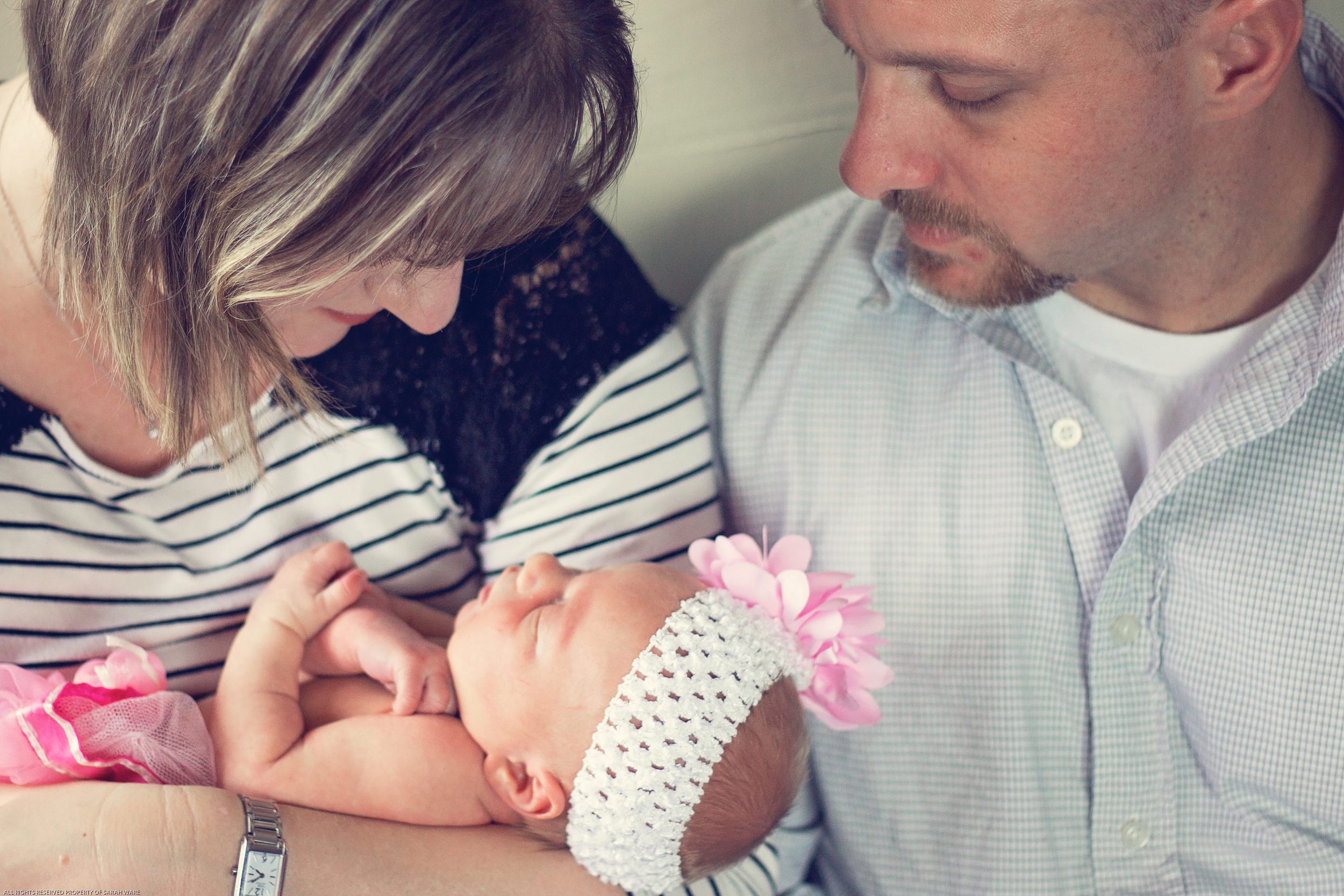 8 days old and already has Daddy wrapped around her finger. 