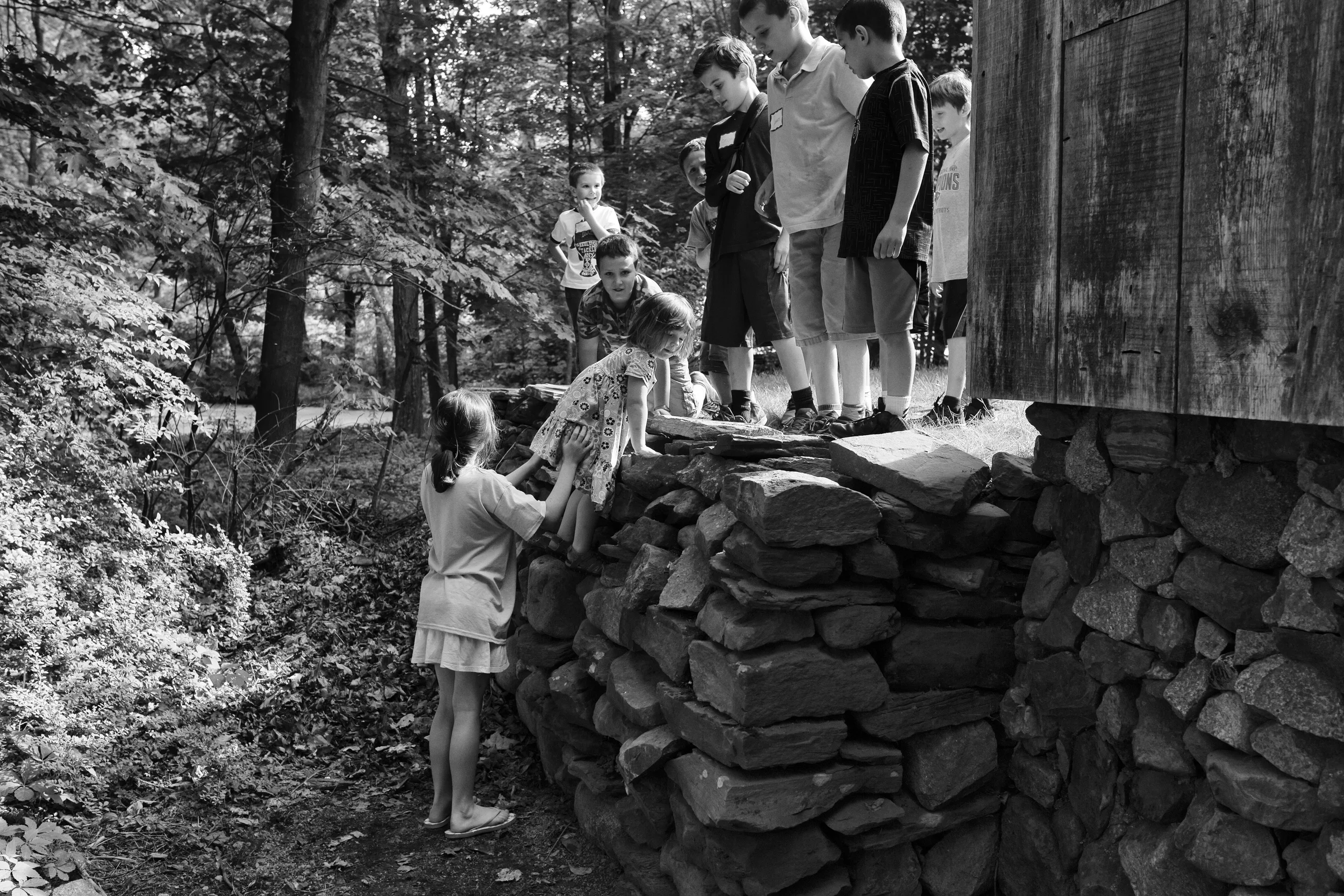 On her own, she took off from me, to join the big kids and run wild. I'll admit, I lost her at first, then found her and never took my eyes off of her. When the boys made a "base" at the back of the barn, she insisted on storming their camp. I watched them gather around and laugh and call out, "A baby is getting in!" But no one would stop her, which was so incredible to see; these boys with such sweet hearts. Besides, I don't think they could've stopped her even if they wanted to. Photo by Olivia Gatti Facebook :: Website