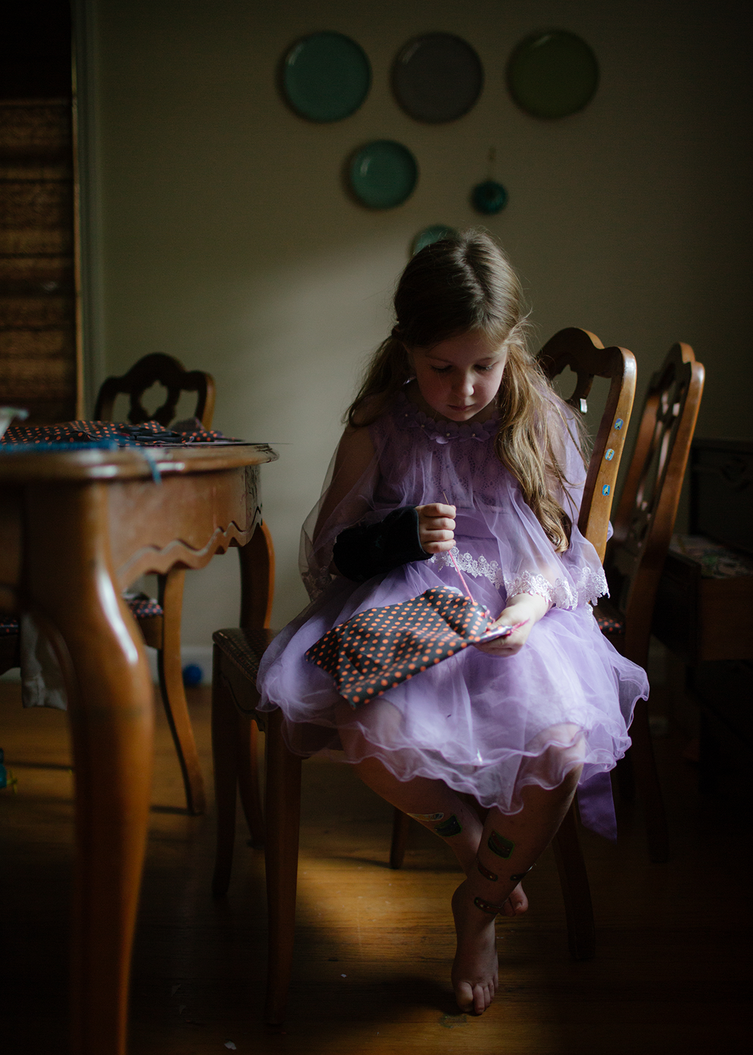 i grew up with a mother who could sew. not only could she sew but she did it very well. she sewed all of our halloween costumes. she sewed our curtains. she sewed to mend things. she sewed for fun. i never once asked her to teach me to sew because it did not look like fun to me. in fact, other than threading a needle, i didn’t know the first thing about using a sewing machine when i took a home ec class in junior high. the teacher knew my mom. they probably had fun sewing together before. so she assumed that i would show my classmates a thing or two about sewing. boy was she wrong. i cried my way through the sewing of that ugly blue sweatshirt. and then i cried some more as i sewed that autograph pillow. i hated every single minute of sewing and couldn’t wait for the class to move on to the cooking section. you learned early on that your weren’t going to grow up with a mother who could sew. therefore, you gave up asking me to teach you. instead, you figured it out on your own. now you find whatever you can get your hands on and sew with it. today it was leftover vinyl from the time that daddy recovered the dining room chairs. the vinyl was so tough. but that didn’t stop you. you used scissors to make a row of tiny holes. you couldn’t find any thread. but that didn’t stop you. you managed to thread a needle with yarn. and there you sat with your good arm sprained sewing me a new purse. Photo by Heather Robinson Photography Blog :: Facebook