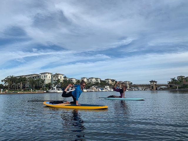 🙌🏼The magic hour! 💙 It&rsquo;s that time of year, we do weeknight evening classes by request. 🌊Thank you Jamie and Lindsey for joining us to kick off summer sunset SUP yoga classes 🌅 The bonus is it&rsquo;s often a private or small group SUP yog