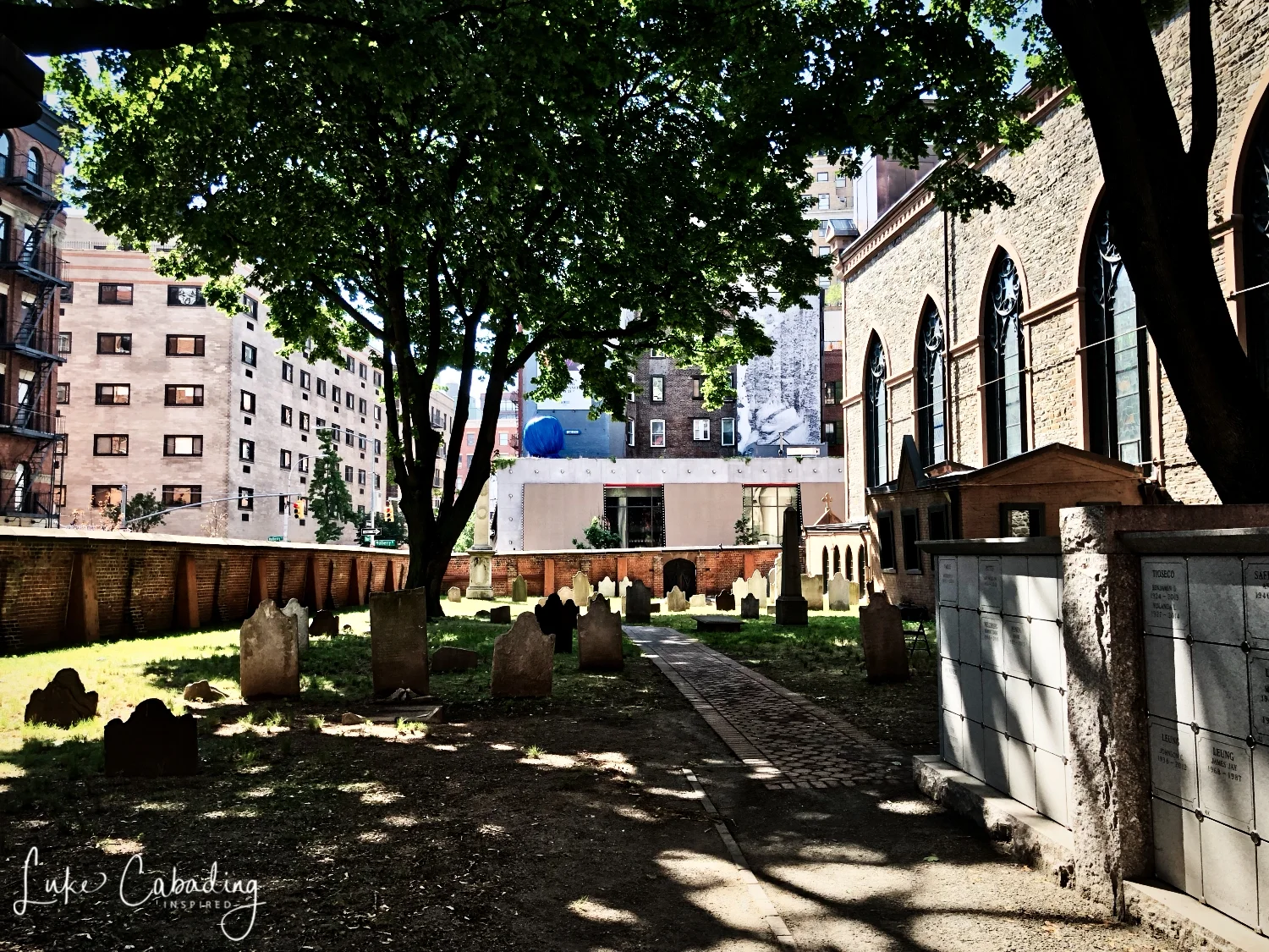 When officials of the newly established Diocese of New York decided to build the city’s first cathedral in 1809, they selected a site at Mott and Prince Streets that was within the burying ground of St. Peter’s Church. St. Peter’s, the city’s first Catholic church, created the cemetery at the beginning of the 19th century when the graveyard around their church on Barclay Street became full. In 1801, they purchased several lots on the northwest corner of Prince and Mott streets, in the area that is now known as NoLita; an 1803 purchase of additional lots on the northeast corner of Prince and Mulberry streets enlarged the new burial ground.