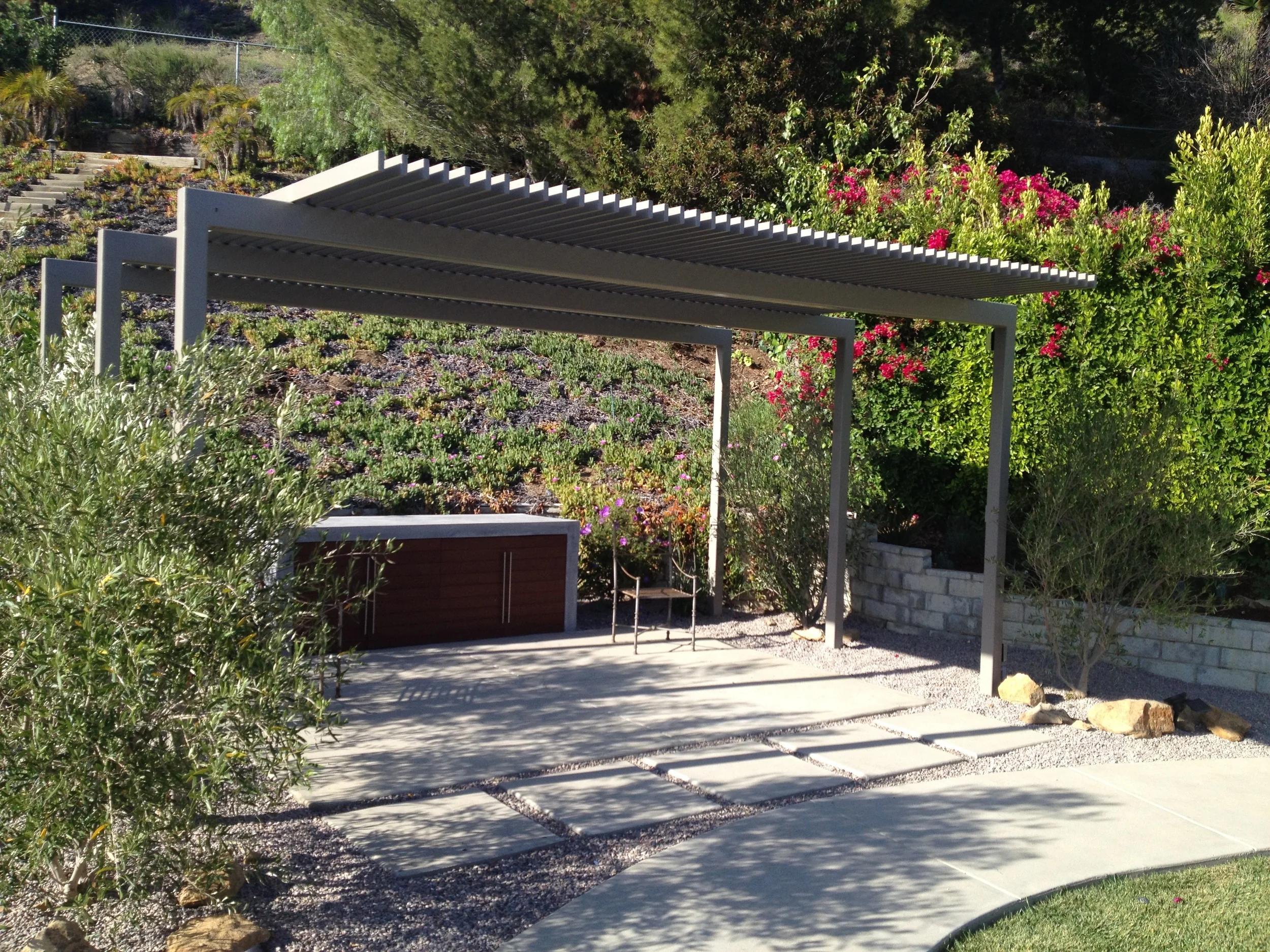  Curves play off of the pool and draw one from main back yard and pool area to this new area. 