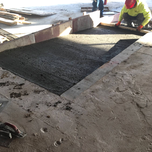 Here the concrete company is installing the new handicap ramp for the office space.