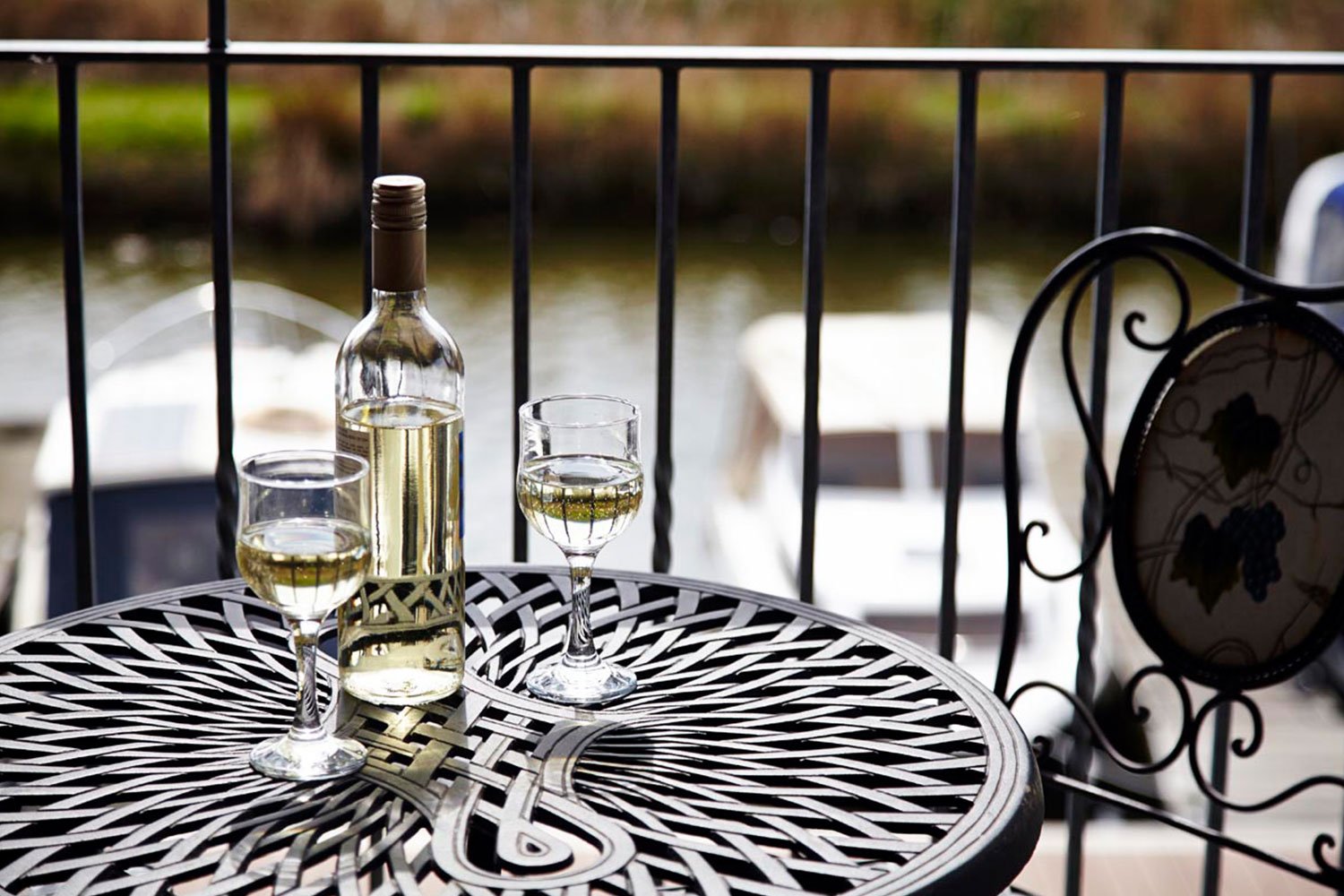 Waveney-River-Centre-wine-glasses-on-balcony.jpg